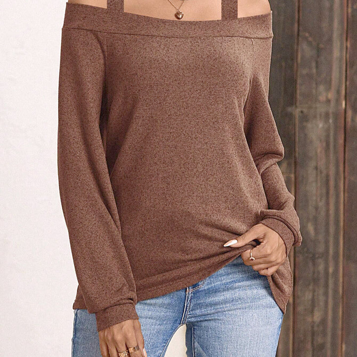 Kvinnor avslappnad tröja med off-shoulder design och speciella band Mirla-Eva Jonsson