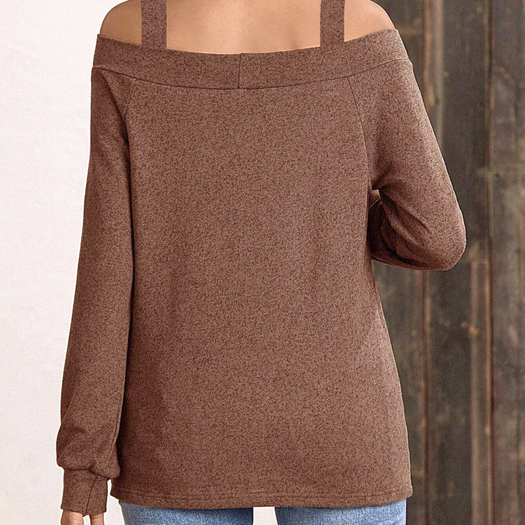 Kvinnor avslappnad tröja med off-shoulder design och speciella band Mirla-Eva Jonsson