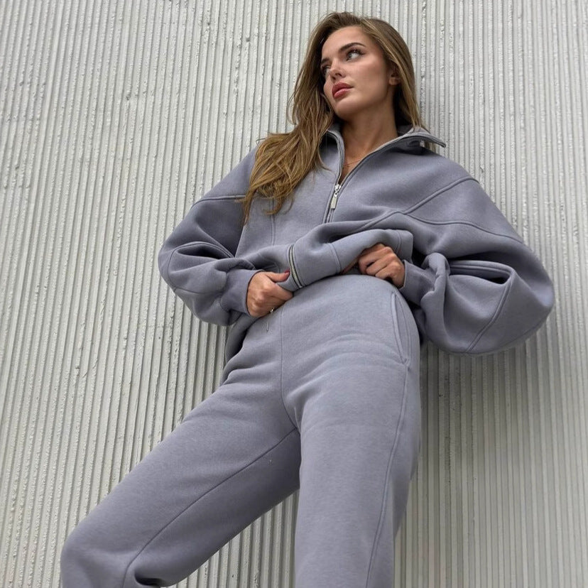 Kvinnor bekväm sweatsuit med voluminösa ärmar och hög krage Mirla-Eva Jonsson