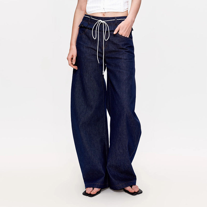 Kvinnor breda denimbyxor med hög midja och trendiga veck.-Eva Jonsson