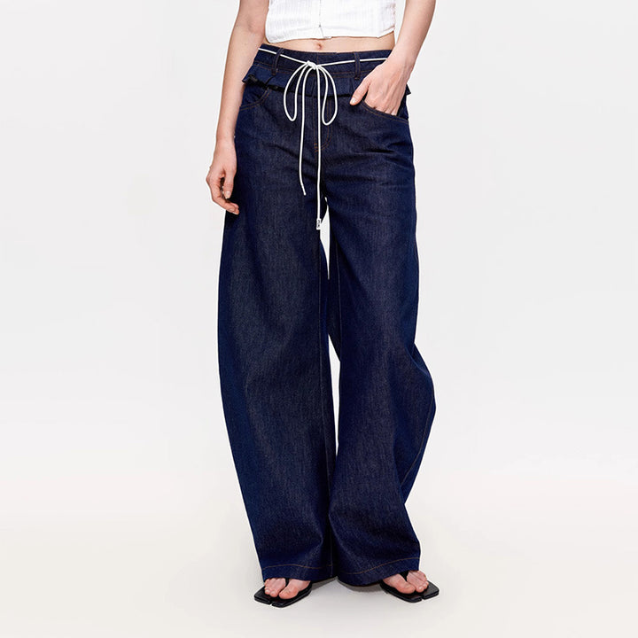 Kvinnor breda denimbyxor med hög midja och trendiga veck.-Eva Jonsson