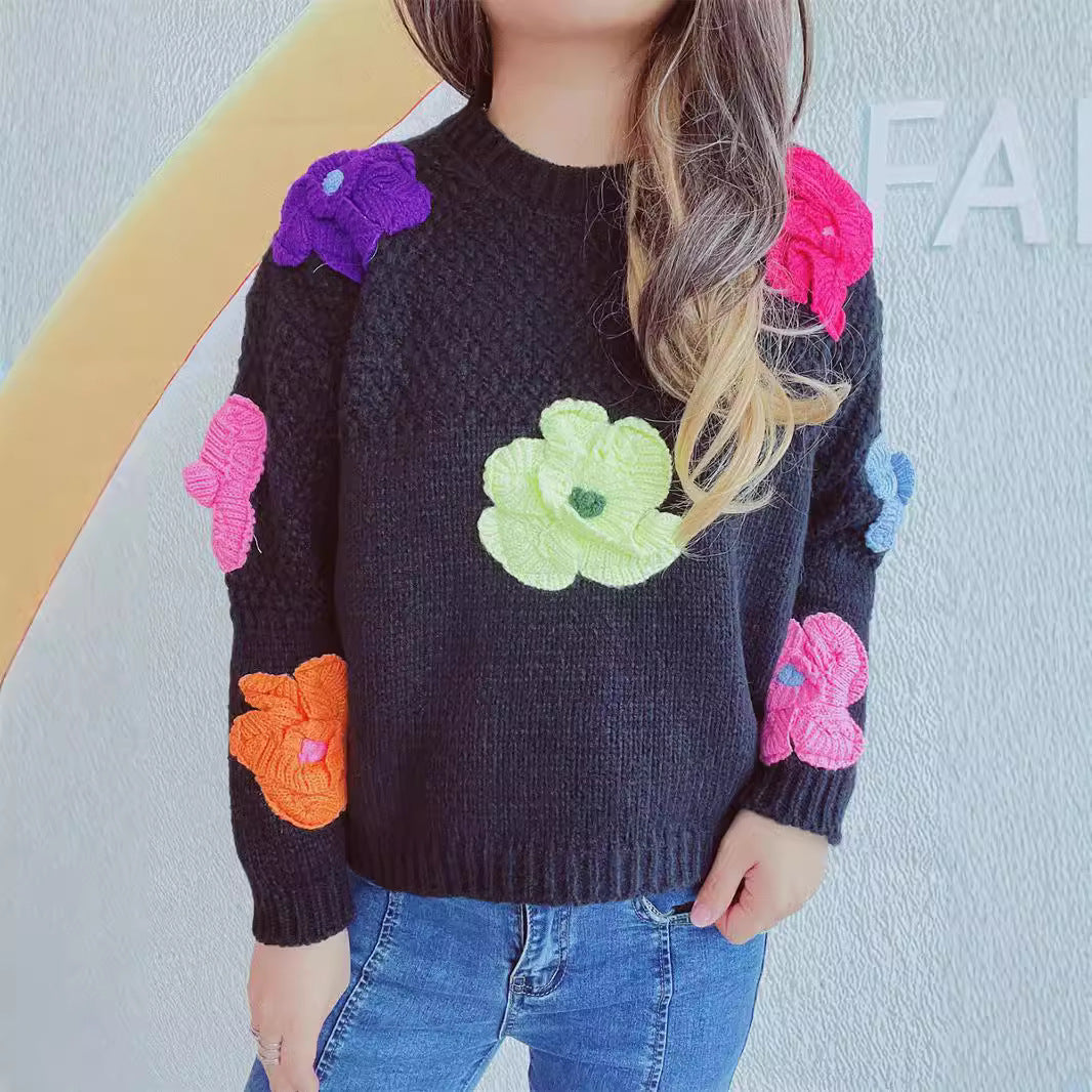 Kvinnor casual tröja med färgglada blommor appliceringar Mirla-Eva Jonsson