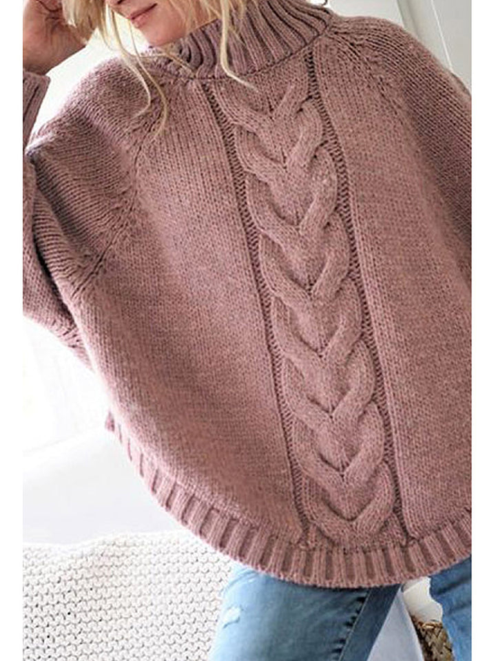 Kvinnor chunky knit tröja med djup polokrage och sofistikerat kabelmönster Mirla-Eva Jonsson