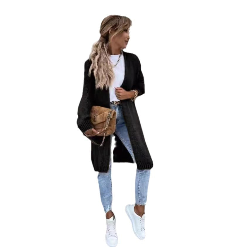 Kvinnor chunky stickad kofta med överdimensionerade ärmar och moderiktig design Mirla-Eva Jonsson