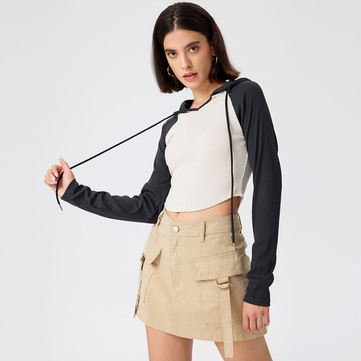 Kvinnor cropped sporttop med huva och långa ärmar Mirla-Eva Jonsson