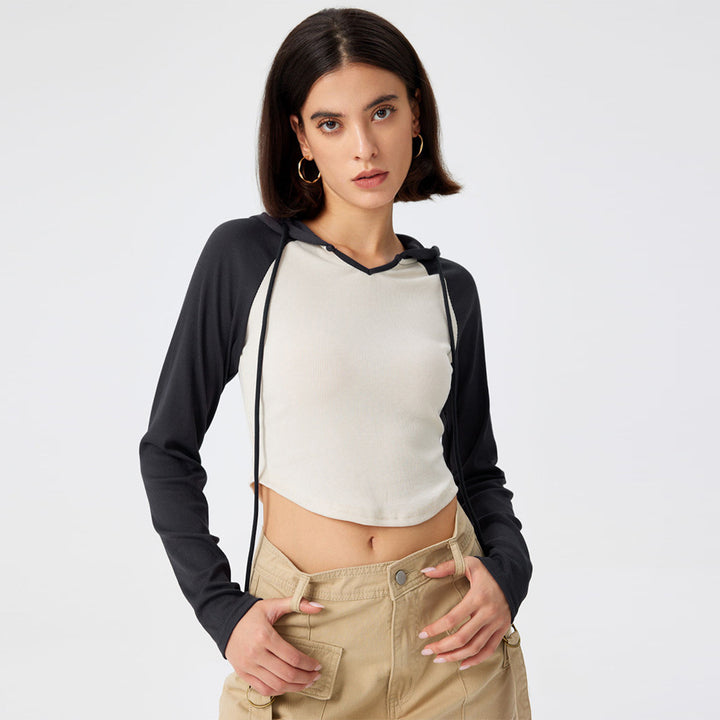Kvinnor cropped sporttop med huva och långa ärmar Mirla-Eva Jonsson