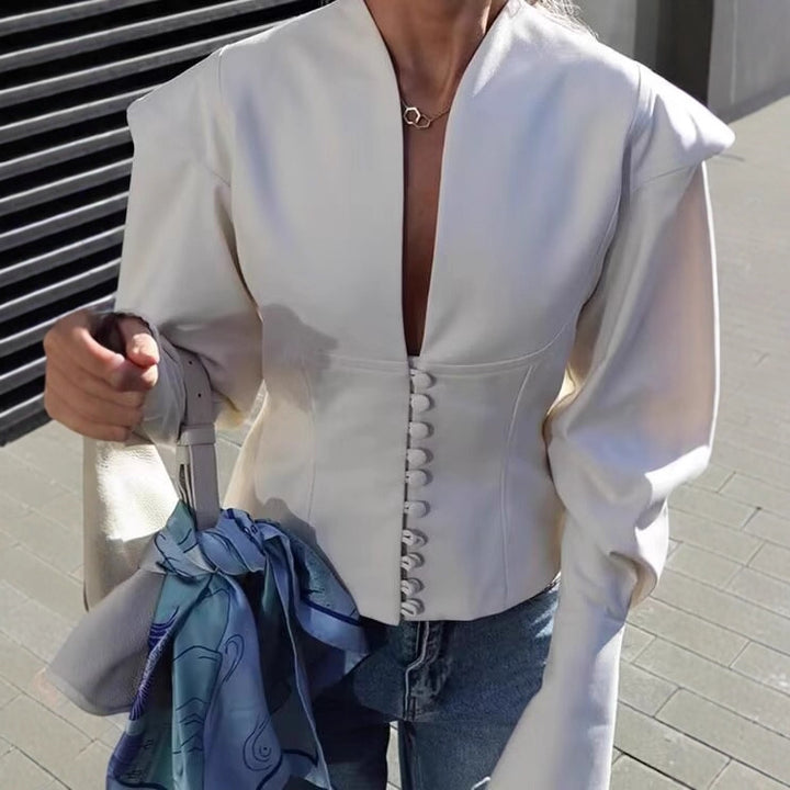 Kvinnor elegant blazer med djup V-hals och dekorativa knappar Mirla-Eva Jonsson