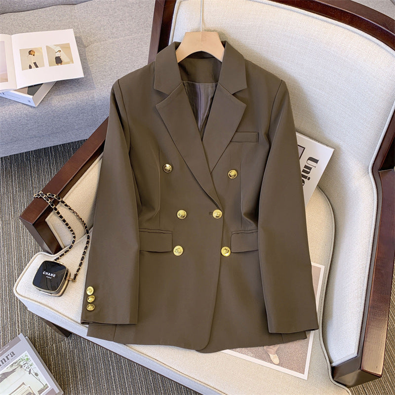 Kvinnor elegant dubbelknäpps-blazer med smal passform och gyllene dekorationer Mirla-Eva Jonsson