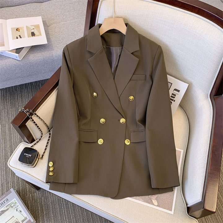 Kvinnor elegant dubbelknäpps-blazer med smal passform och gyllene dekorationer Mirla-Eva Jonsson