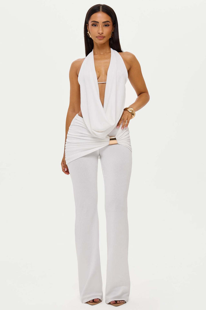 Kvinnor elegant, figurnära jumpsuit med djup halsringning och vida ben Mirla-Eva Jonsson