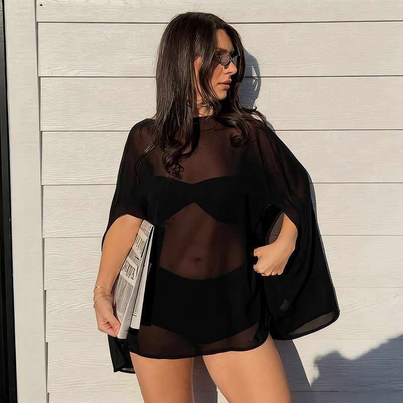 Kvinnor elegant genomskinlig poncho med makramé-detalj Mirla-Eva Jonsson