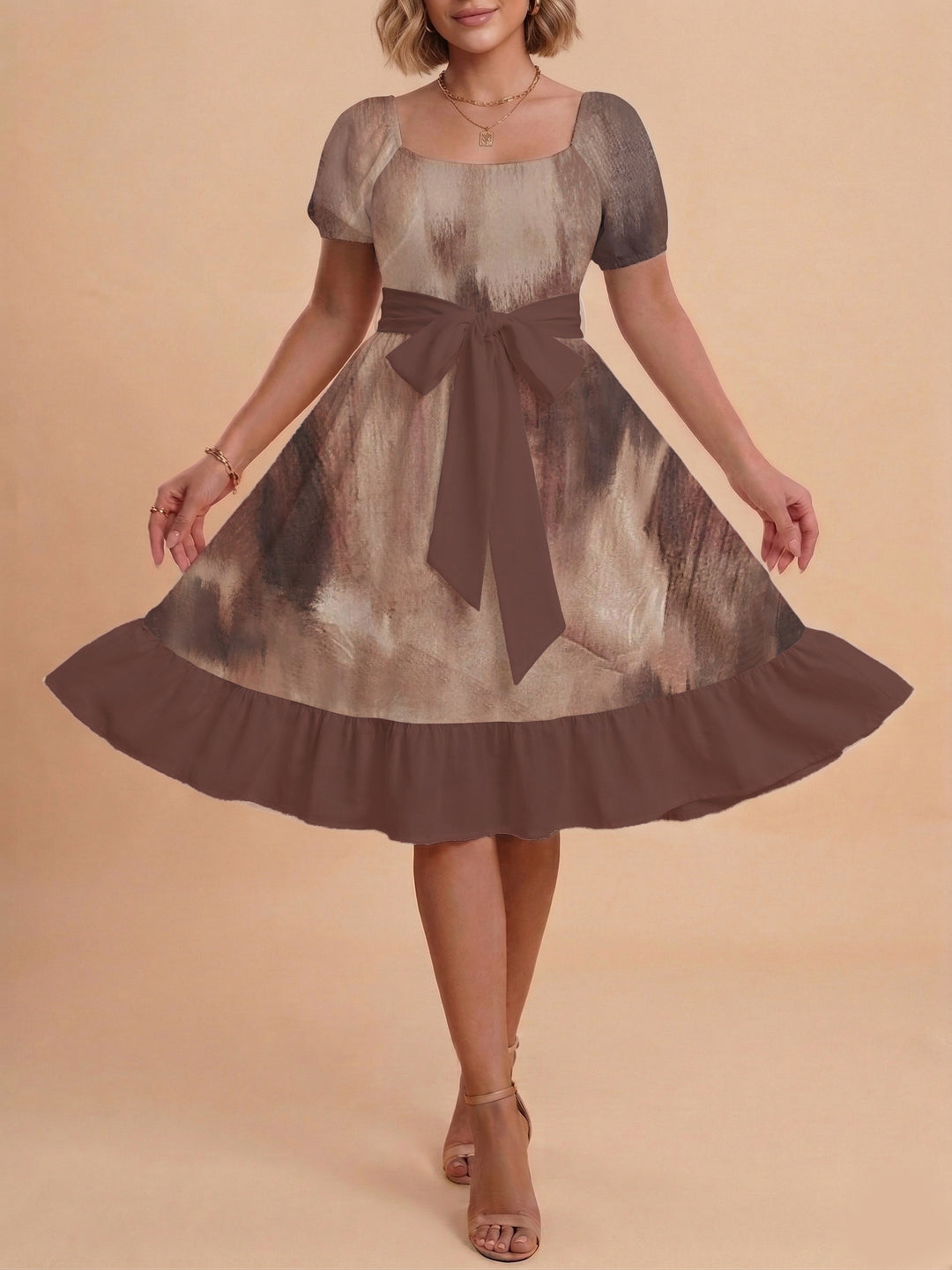 Kvinnor elegant glittrande klänning med figursydd passform och volangkant Mirla-Eva Jonsson