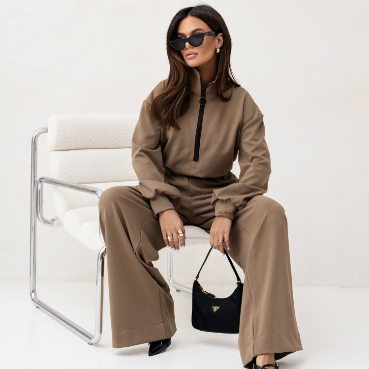 Kvinnor elegant jumpsuit med hög krage och dragkedja Mirla-Eva Jonsson