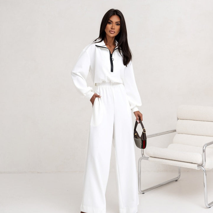 Kvinnor elegant jumpsuit med hög krage och dragkedja Mirla-Eva Jonsson