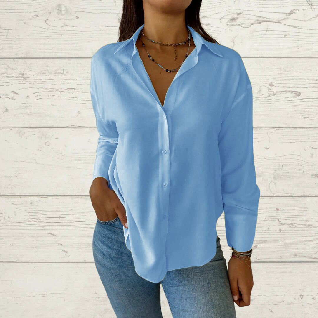 Kvinnor elegant långärmad blus med fint tyg och feminina detaljer Mirla-Eva Jonsson