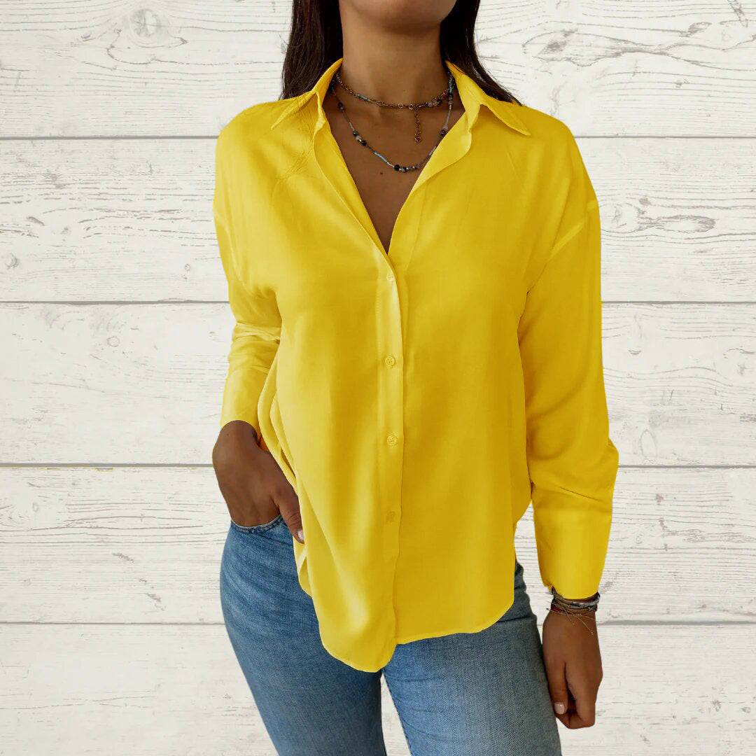 Kvinnor elegant långärmad blus med fint tyg och feminina detaljer Mirla-Eva Jonsson