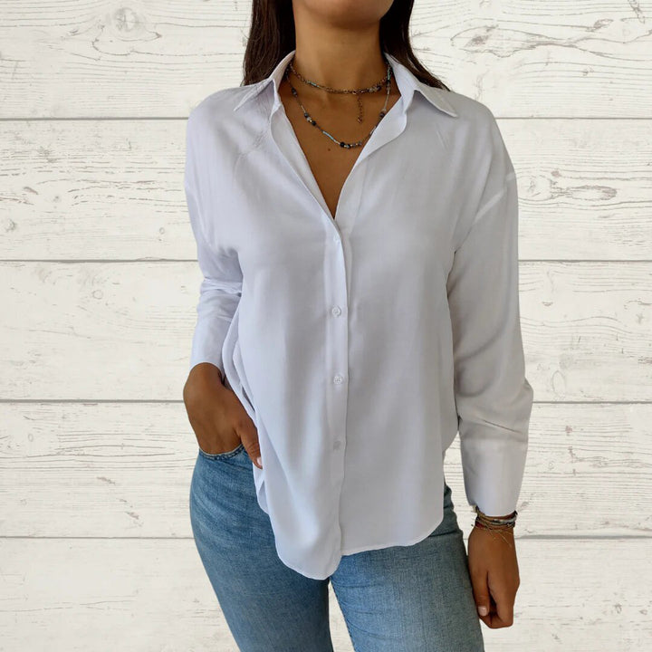 Kvinnor elegant långärmad blus med fint tyg och feminina detaljer Mirla-Eva Jonsson