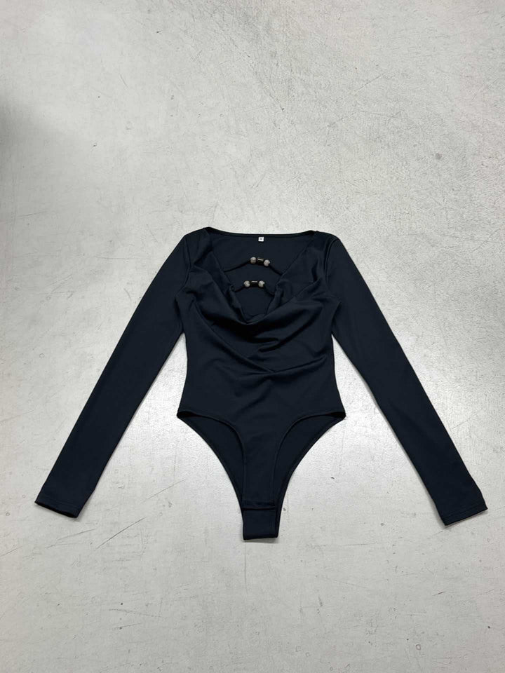 Kvinnor elegant långärmad bodysuit med moderiktig utskärning Mirla-Eva Jonsson