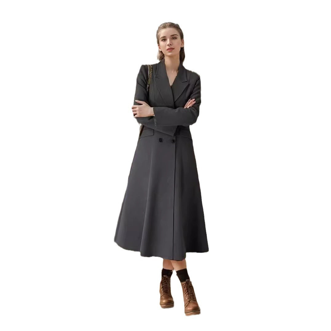 Kvinnor elegant maxikappa med dubbel knapprad och vid svängande kjol Mirla-Eva Jonsson