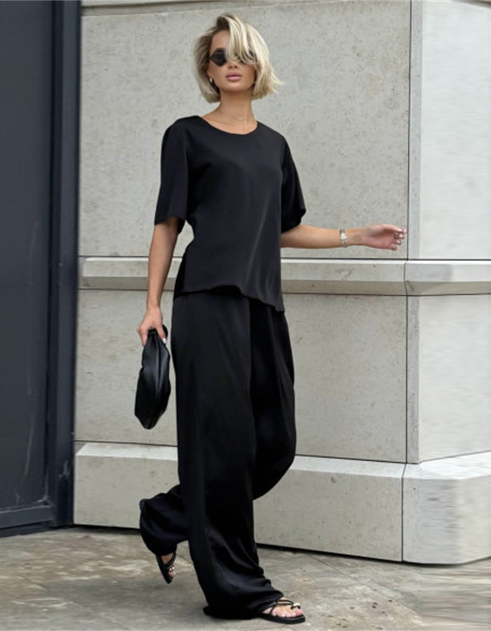 Kvinnor elegant och flödande tvådelat set med löst överdel och vida byxor Mirla-Eva Jonsson
