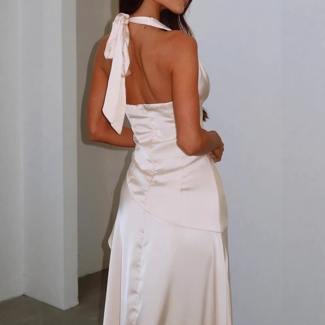 Kvinnor elegant omlottklänning med asymmetrisk skärning och halterneck Mirla-Eva Jonsson