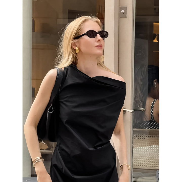 Kvinnor elegant omslagklänning med asymmetrisk skärning och fin midjedetalj Mirla-Eva Jonsson