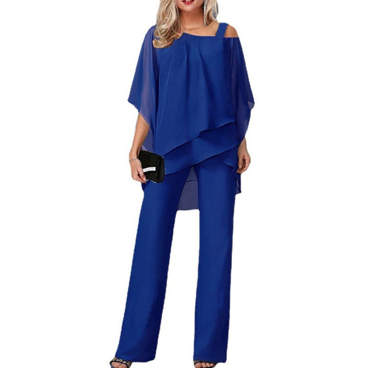 Kvinnor elegant tvådelat set med asymmetrisk topp och vida byxor Mirla-Eva Jonsson