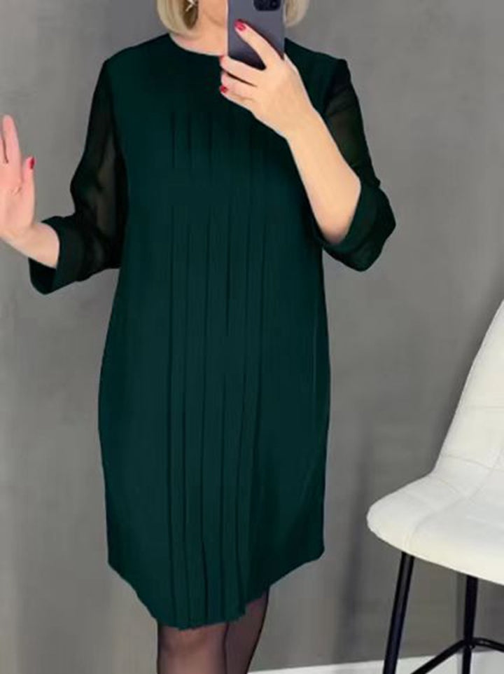 Kvinnor elegant volangklänning med transparenta ärmar Mirla-Eva Jonsson