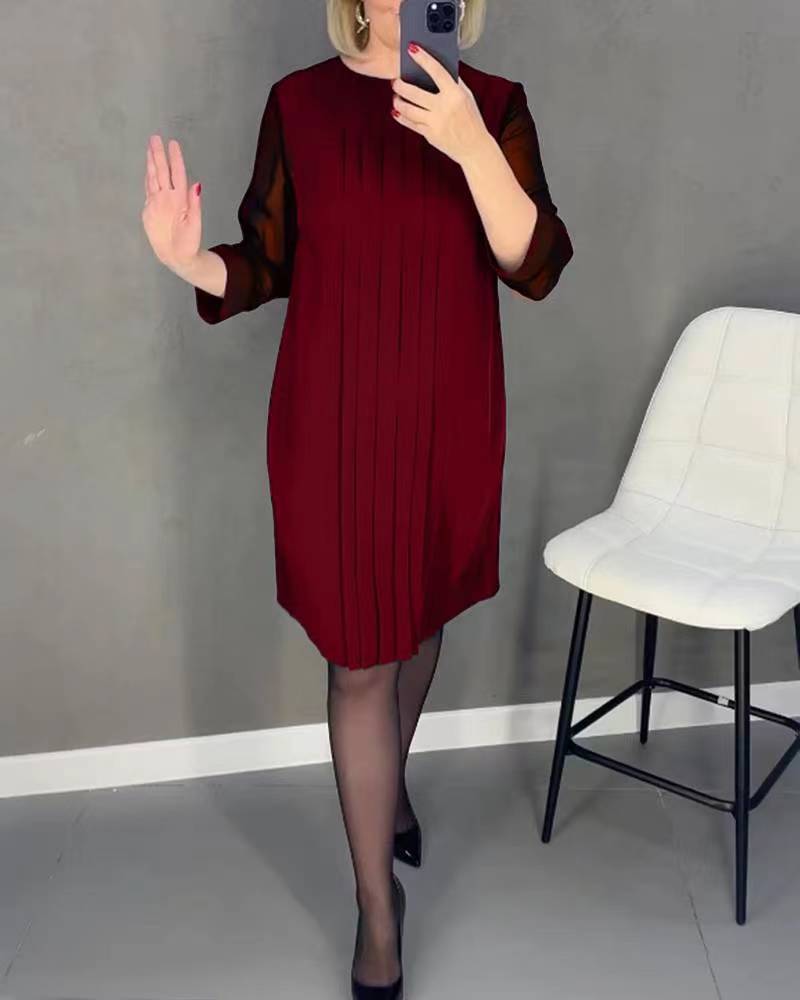 Kvinnor elegant volangklänning med transparenta ärmar Mirla-Eva Jonsson