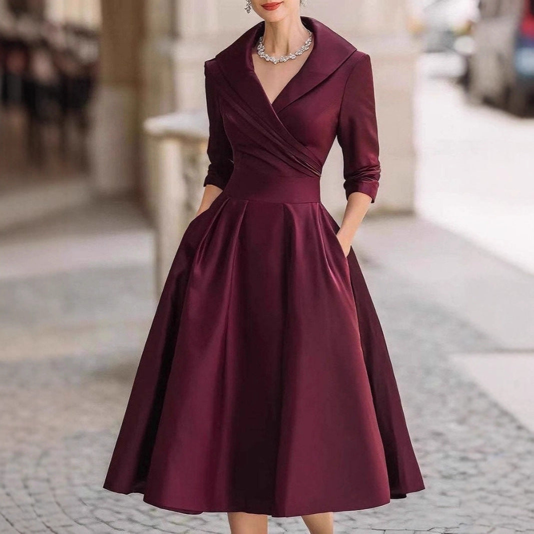 Kvinnor elegant wrap klänning med peplum och praktiska fickor Mirla-Eva Jonsson