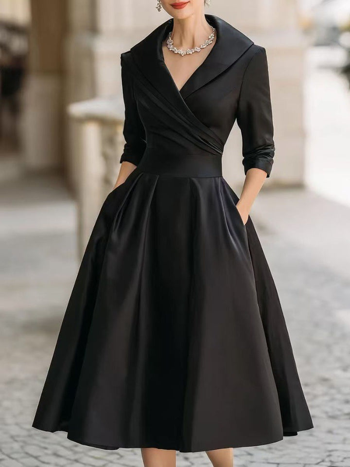 Kvinnor elegant wrap klänning med peplum och praktiska fickor Mirla-Eva Jonsson