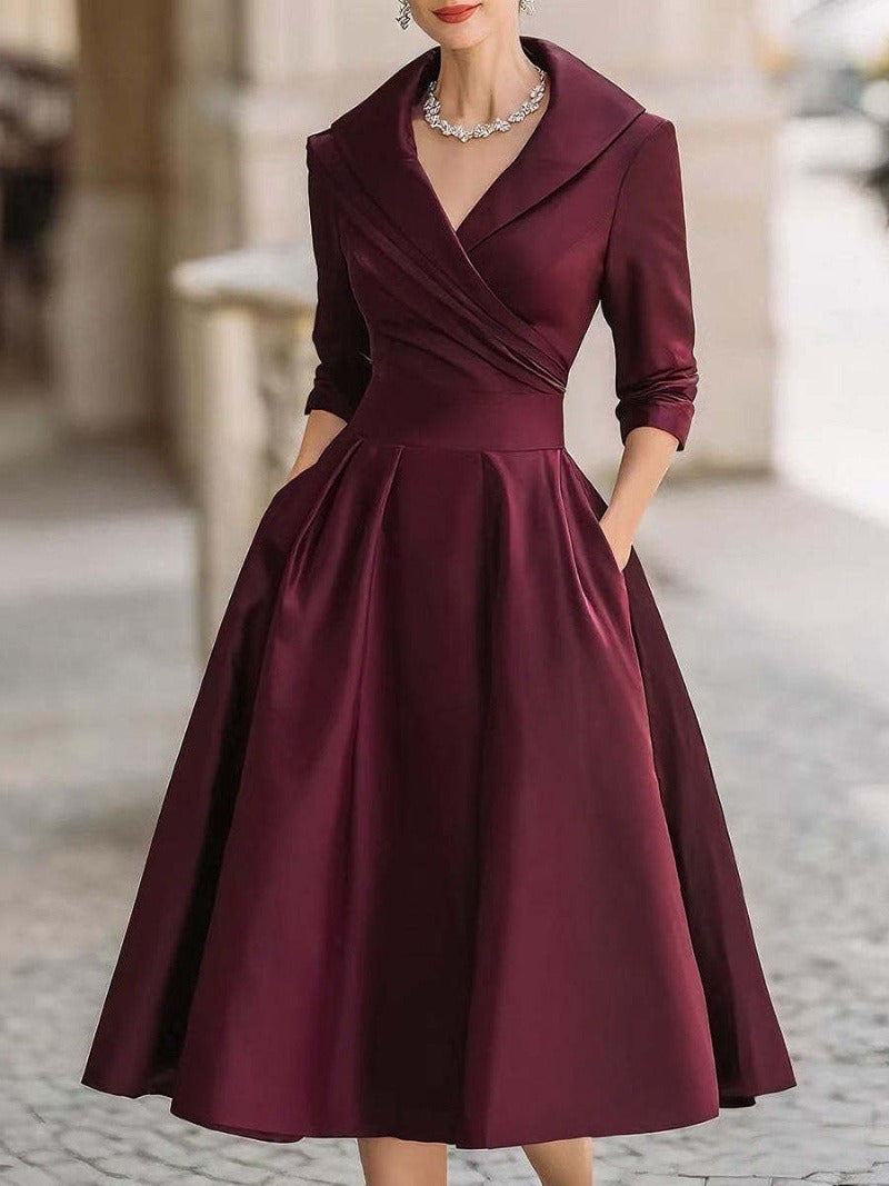 Kvinnor elegant wrap klänning med peplum och praktiska fickor Mirla-Eva Jonsson