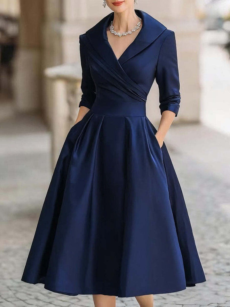 Kvinnor elegant wrap klänning med peplum och praktiska fickor Mirla-Eva Jonsson