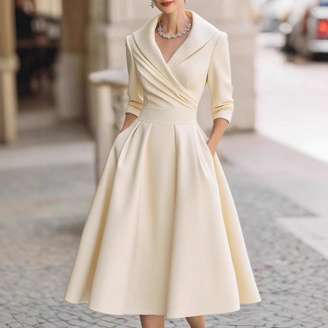Kvinnor elegant wrap klänning med peplum och praktiska fickor Mirla-Eva Jonsson