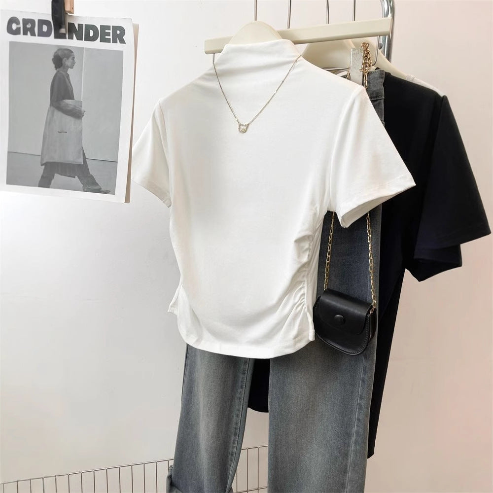 Kvinnor figursydd T-shirt med ståkrage och sofistikerad volangdetalj-Eva Jonsson