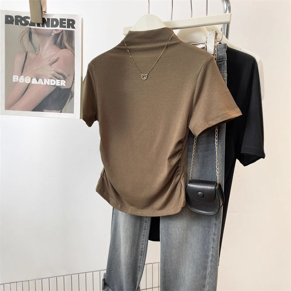 Kvinnor figursydd T-shirt med ståkrage och sofistikerad volangdetalj-Eva Jonsson