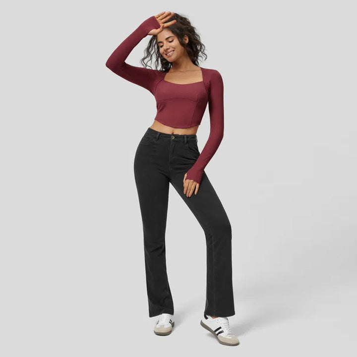 Kvinnor figursydd långärmad crop top med fyrkantig halsringning och fin ribbad material Mirla-Eva Jonsson