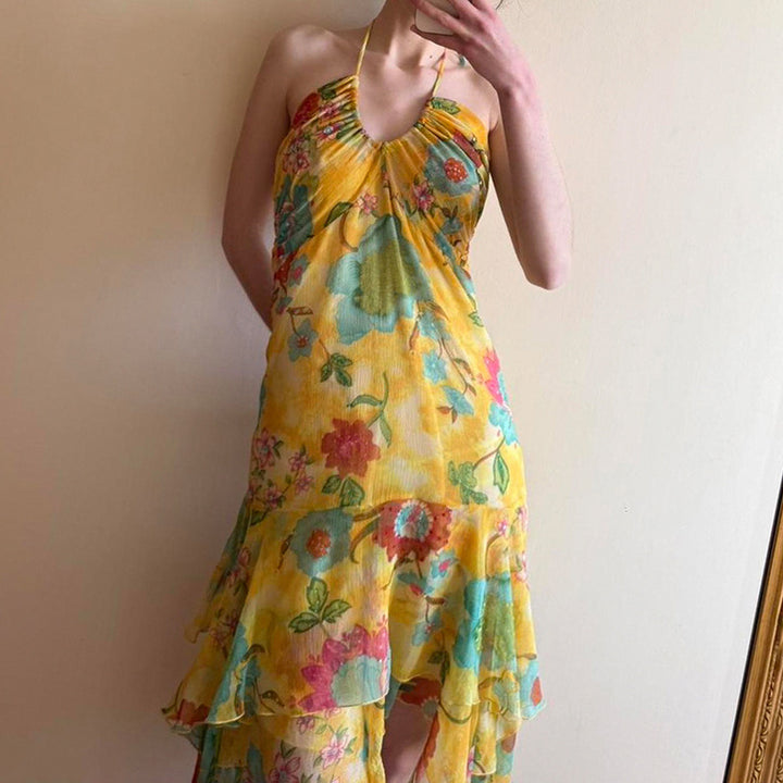 Kvinnor flytande Maxi-klänning med blommönster och volanger Mirla-Eva Jonsson
