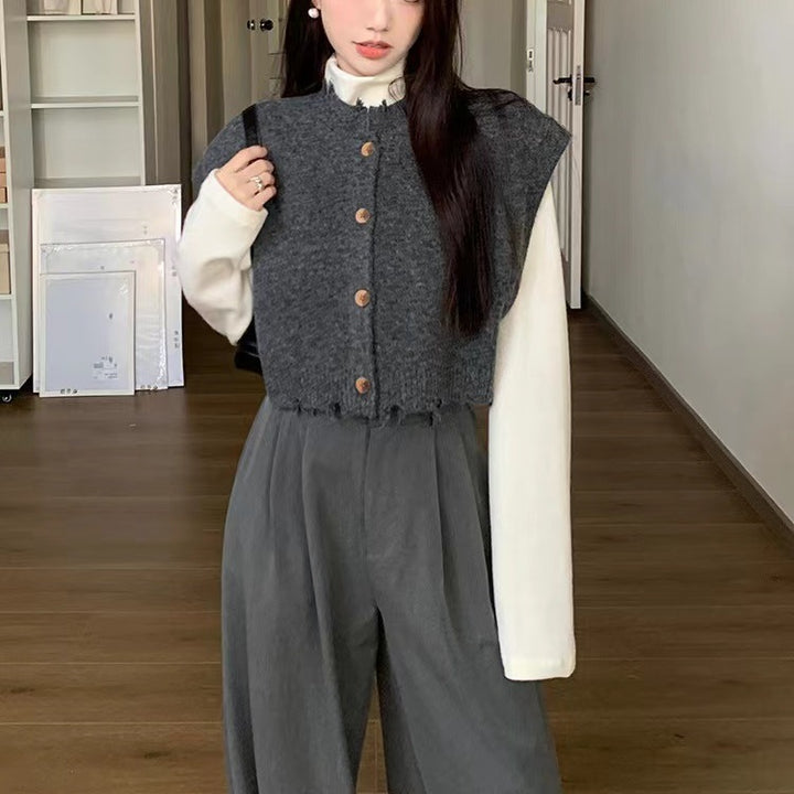 Kvinnor kort cardigan med slits hem och träknapplösa detaljer Mirla-Eva Jonsson