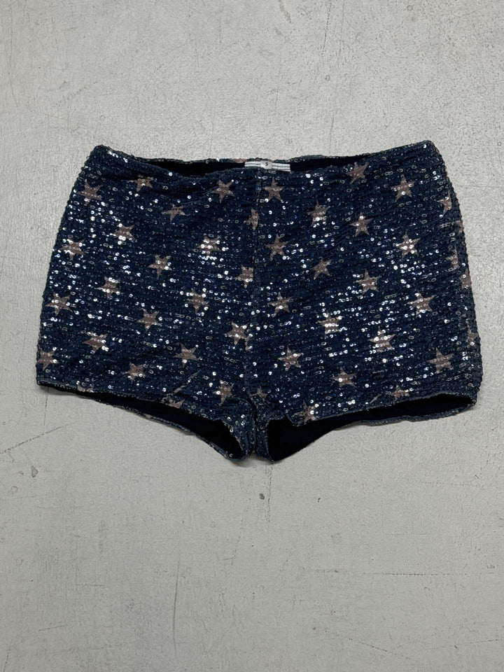 Kvinnor minikjol med glittrande polka-dot mönster och elastisk midja Mirla-Eva Jonsson