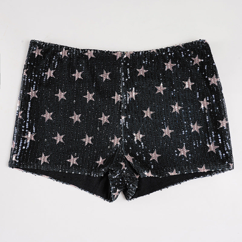 Kvinnor minikjol med glittrande polka-dot mönster och elastisk midja Mirla-Eva Jonsson