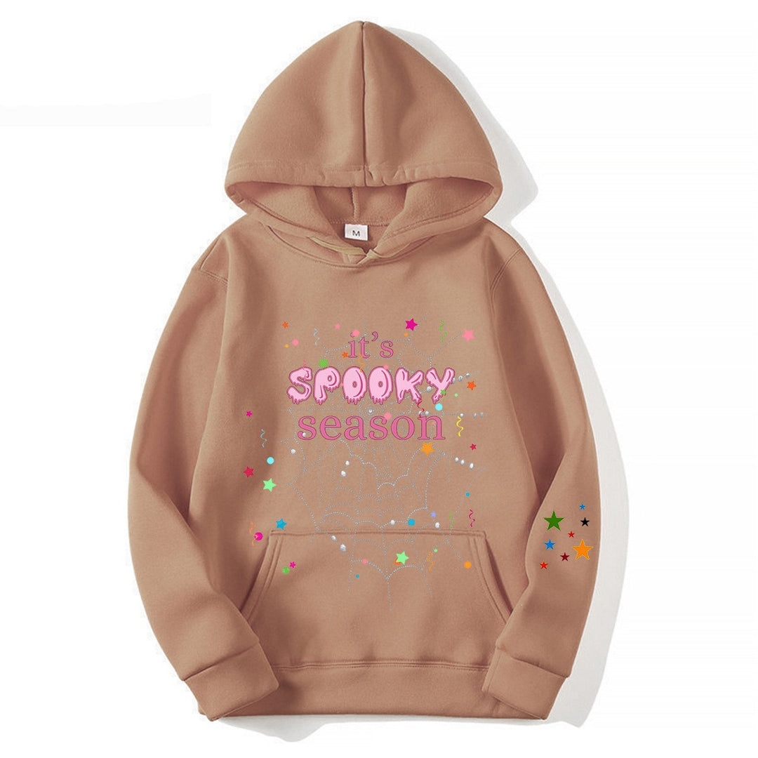 Kvinnor mysig hoodie med grafisk Halloween-design Mirla-Eva Jonsson