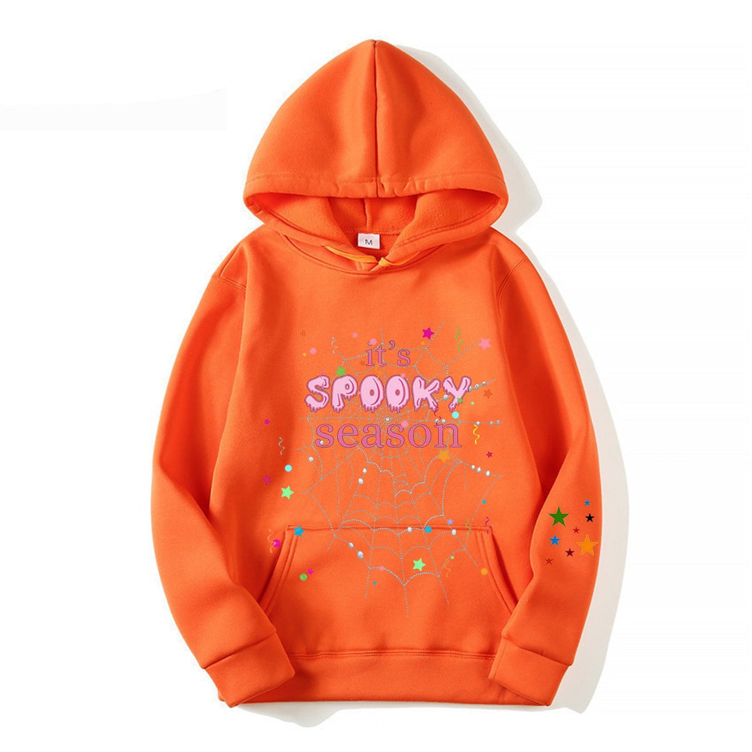 Kvinnor mysig hoodie med grafisk Halloween-design Mirla-Eva Jonsson