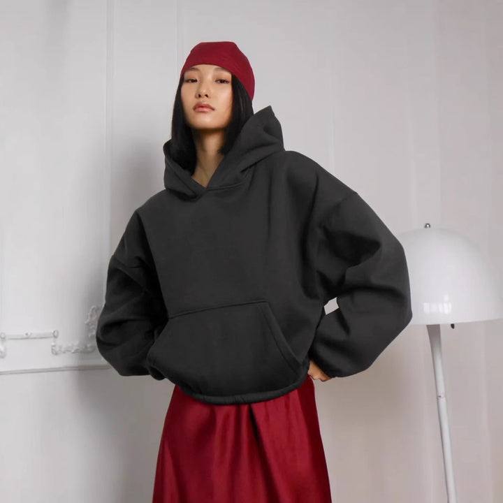 Kvinnor mysig oversized hoodie med elastiska mudd och känguruficka Mirla-Eva Jonsson