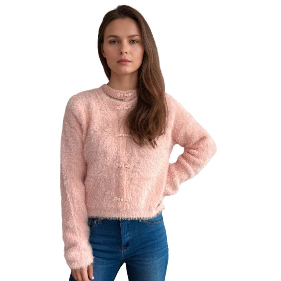 Kvinnor mysig tröja med hög krage och dekorativa knapppdetaljer Mirla-Eva Jonsson