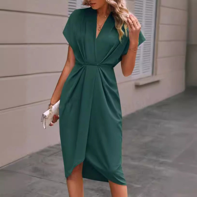 Kvinnor omlottklänning med elegant V-ringning och drapering Mirla-Eva Jonsson
