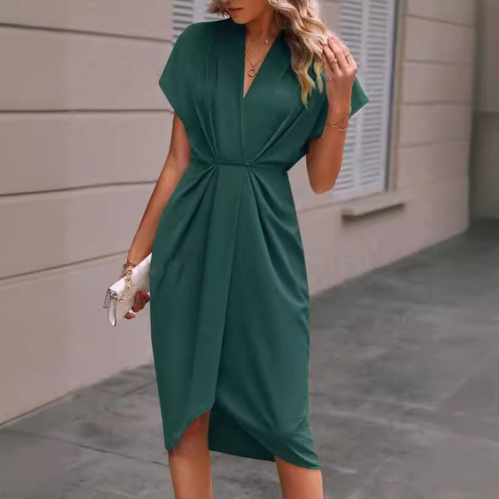 Kvinnor omlottklänning med elegant V-ringning och drapering Mirla-Eva Jonsson