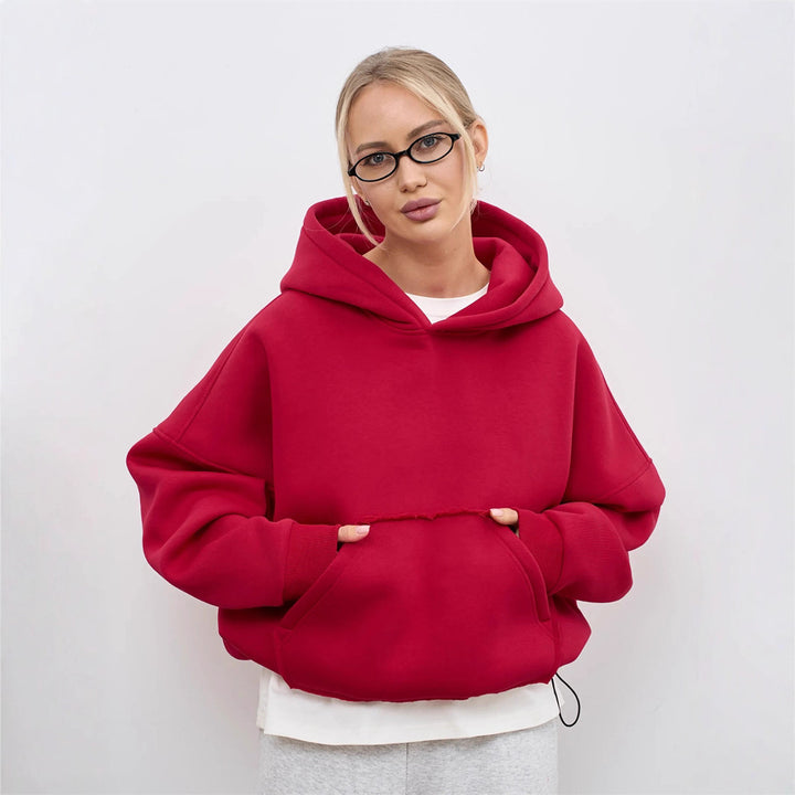 Kvinnor oversized hoodie med avslappnad skärning och praktisk kängurufickan Mirla-Eva Jonsson