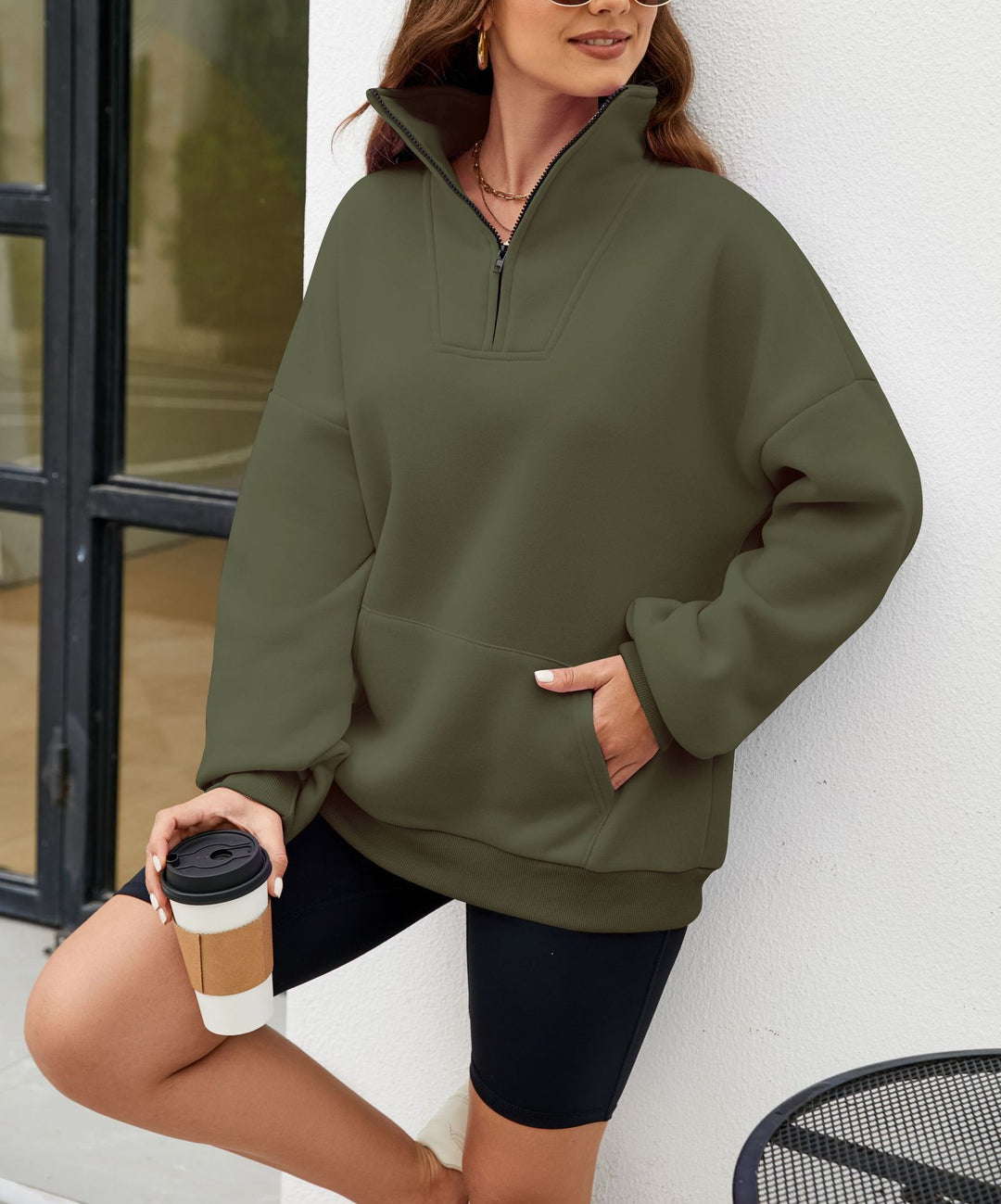 Kvinnor sportig halvdragkedja sweatshirt med praktiska fickor Mirla-Eva Jonsson