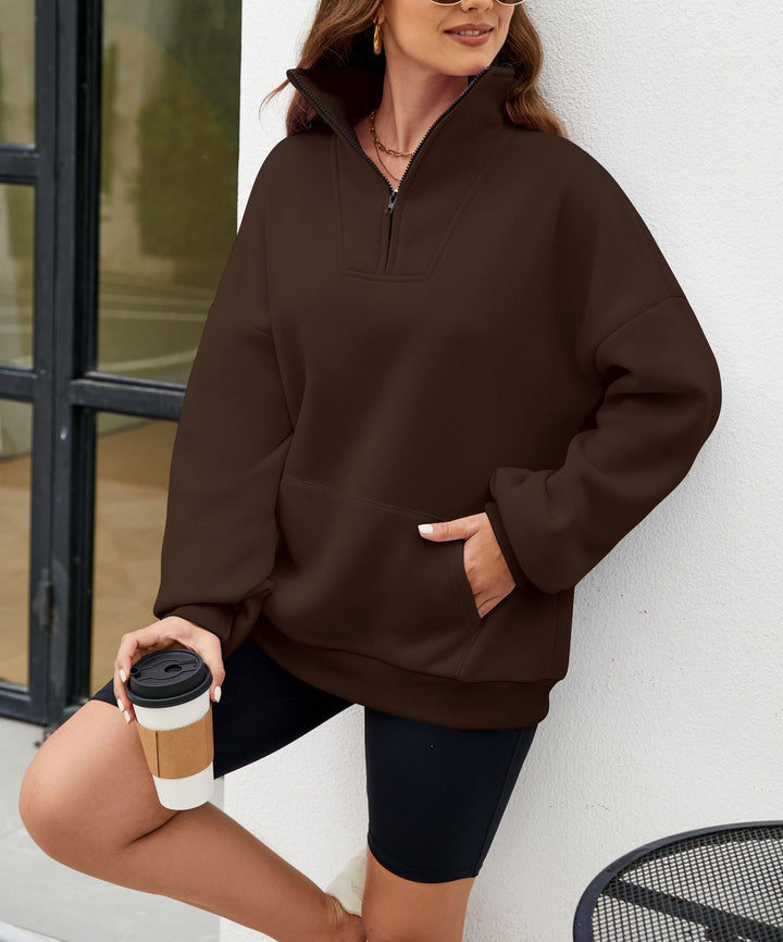 Kvinnor sportig halvdragkedja sweatshirt med praktiska fickor Mirla-Eva Jonsson